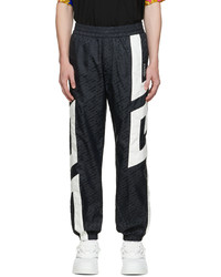 Pantaloni sportivi stampati neri e bianchi di Versace