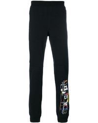Pantaloni sportivi stampati neri di Versace