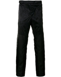 Pantaloni stampati neri di Versace