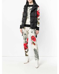 Pantaloni stretti in fondo a fiori bianchi di Moncler