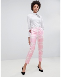 Pantaloni stretti in fondo a quadri rosa di ASOS DESIGN