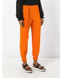 Pantaloni stretti in fondo arancioni di MSGM