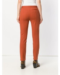 Pantaloni stretti in fondo arancioni di Tory Burch