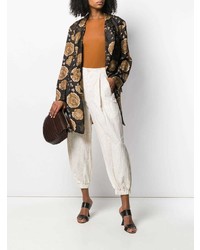 Pantaloni stretti in fondo di lino effetto tie-dye beige di Uma Wang