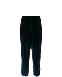 Pantaloni stretti in fondo di velluto blu scuro