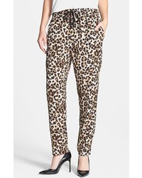 Pantaloni stretti in fondo leopardati marroni