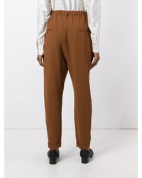 Pantaloni stretti in fondo marroni