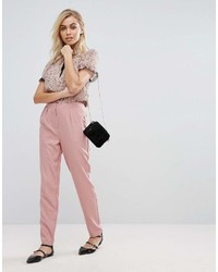 Pantaloni stretti in fondo rosa di Fashion Union
