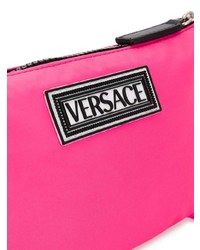 Pochette in pelle fucsia di Versace