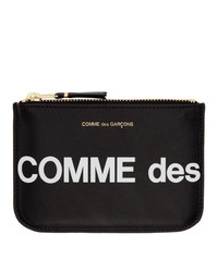Pochette in pelle stampata nera e bianca di Comme des Garcons Wallets