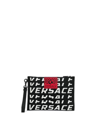Pochette in pelle stampata nera di Versace
