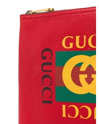 Pochette in pelle stampata rossa di Gucci