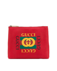 Pochette in pelle stampata rossa di Gucci