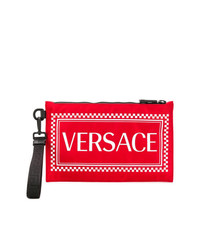 Pochette in pelle stampata rossa di Versace