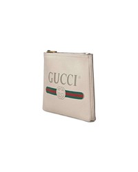 Pochette stampata beige di Gucci