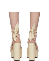Sandali con tacco in pelle beige di Saint Laurent