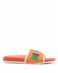 Sandali di tela arancioni di Moschino