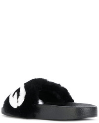 Sandali piatti di pelliccia neri di Dolce & Gabbana