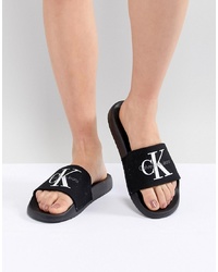Sandali piatti di tela ricamati neri di Calvin Klein