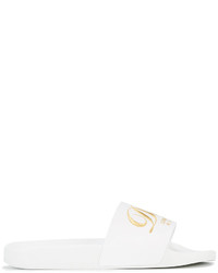 Sandali piatti in pelle bianchi di Dolce & Gabbana