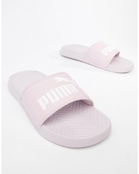 Sandali piatti in pelle rosa di Puma