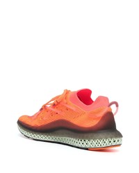 Scarpe sportive arancioni di adidas