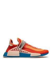 Scarpe sportive arancioni di Adidas By Pharrell Williams