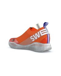 Scarpe sportive arancioni di Swear