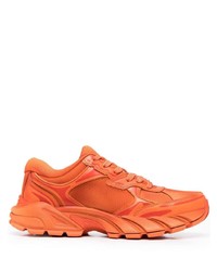 Scarpe sportive arancioni di Heron Preston