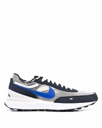 Scarpe sportive bianche e blu scuro di Nike