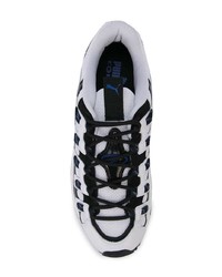 Scarpe sportive bianche e nere di Puma