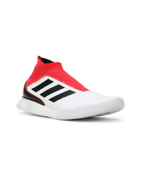 Scarpe sportive bianche e rosse di adidas
