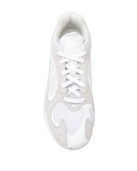 Scarpe sportive bianche di adidas