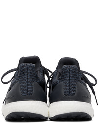 Scarpe sportive blu scuro e bianche di adidas Originals