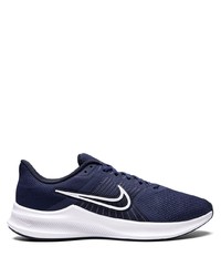Scarpe sportive blu scuro e bianche di Nike