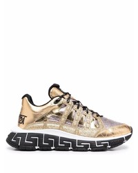 Scarpe sportive dorate di Versace