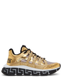 Scarpe sportive dorate di Versace