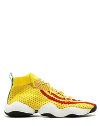 Scarpe sportive gialle di adidas