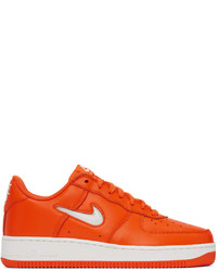 Scarpe sportive in pelle arancioni di Nike