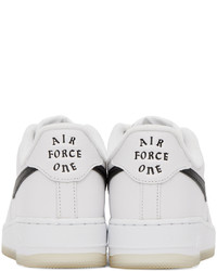 Scarpe sportive in pelle bianche e nere di Nike