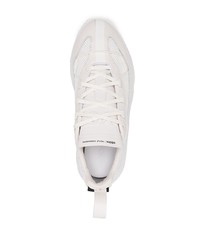 Scarpe sportive in pelle bianche di adidas