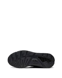 Scarpe sportive in pelle nere di adidas