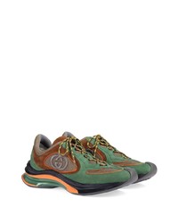 Scarpe sportive in pelle scamosciata verde oliva di Gucci