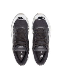 Scarpe sportive in pelle stampate nere di Adidas By Raf Simons