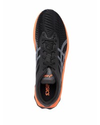 Scarpe sportive nere e arancione di Asics