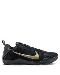 Scarpe sportive nere e dorate di Nike