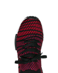 Scarpe sportive rosse e nere di adidas