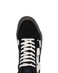 Sneakers alte a quadri nere e bianche di Vans