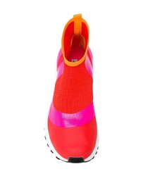 Sneakers alte arancioni di adidas by Stella McCartney
