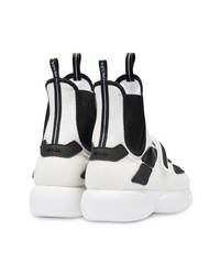 Sneakers alte bianche e nere di Prada
